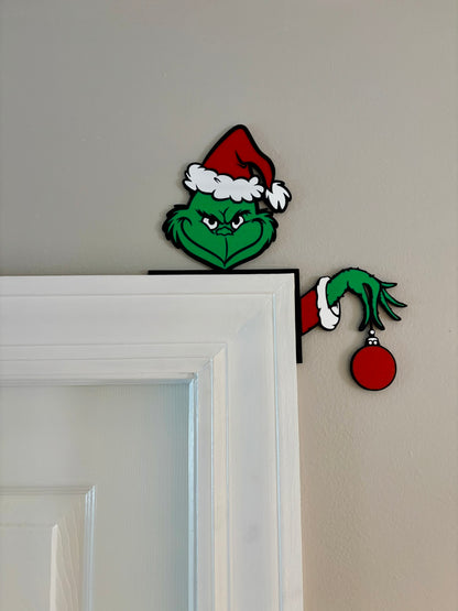 Grinch with Ornament Door Corner