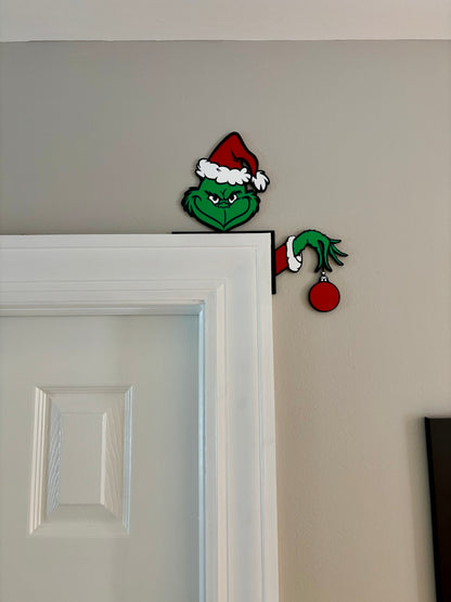 Grinch with Ornament Door Corner