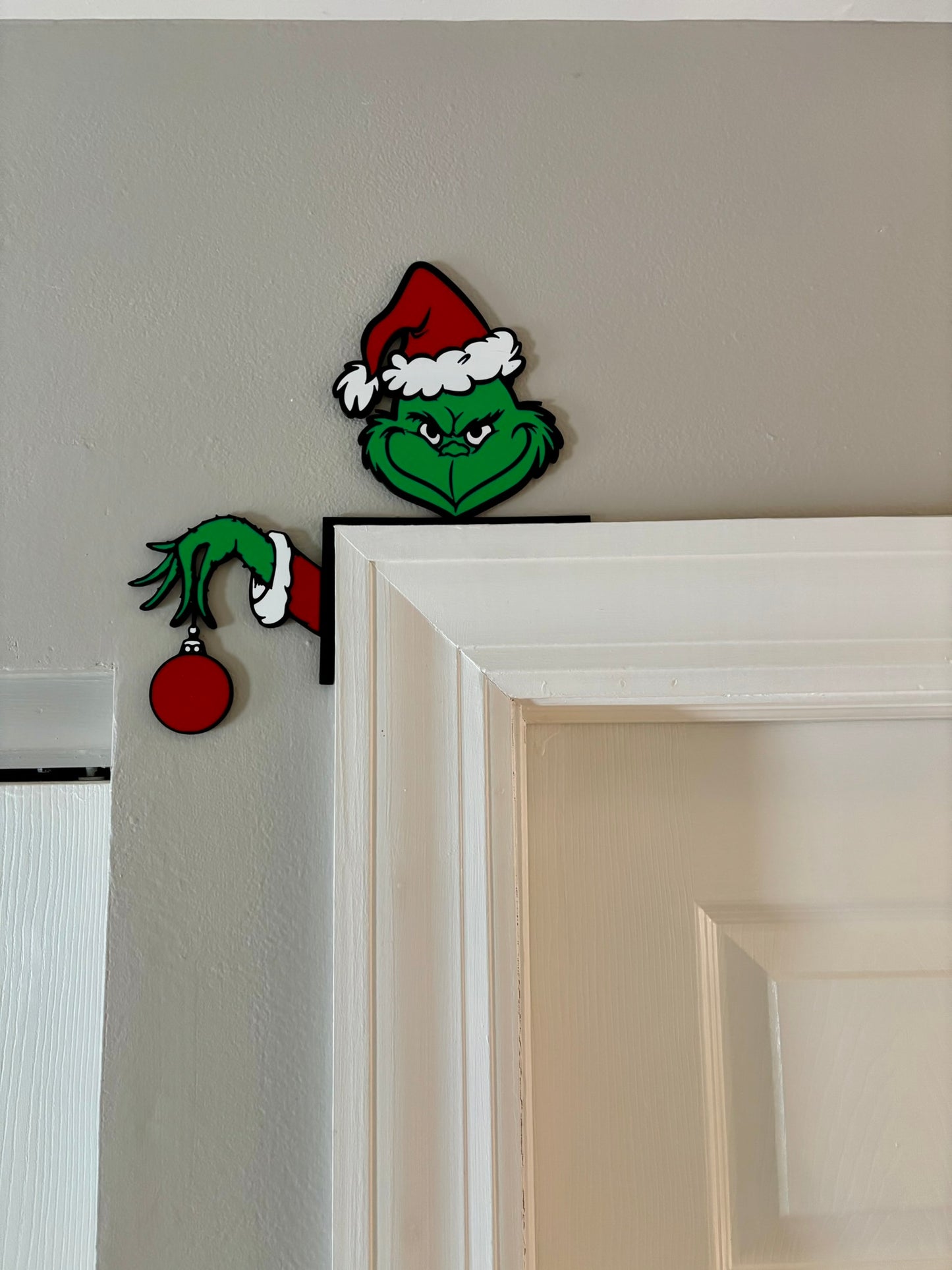 Grinch with Ornament Door Corner