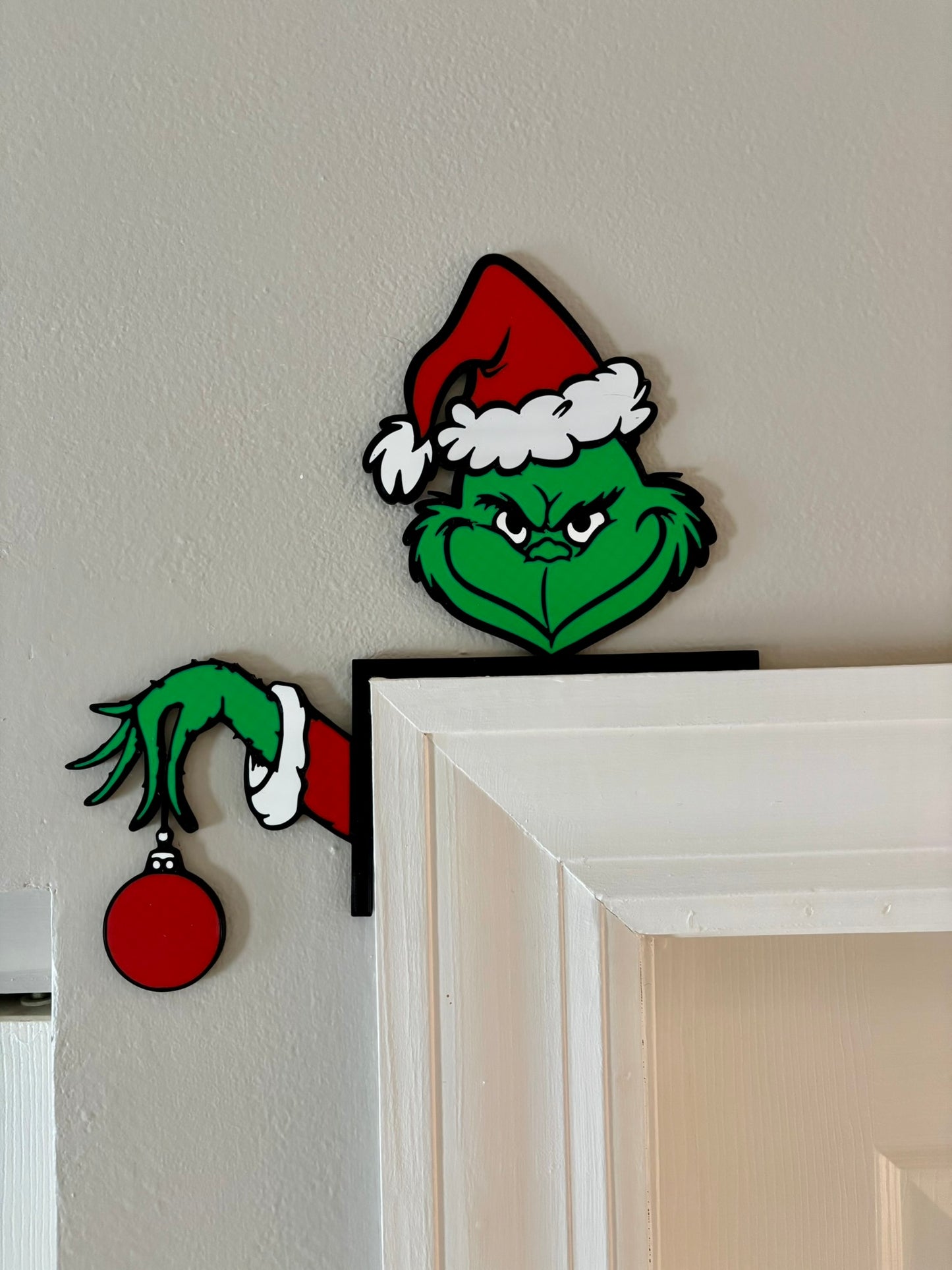 Grinch with Ornament Door Corner